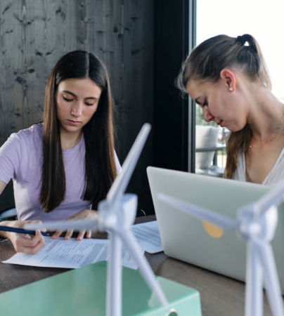 two woman working in the office