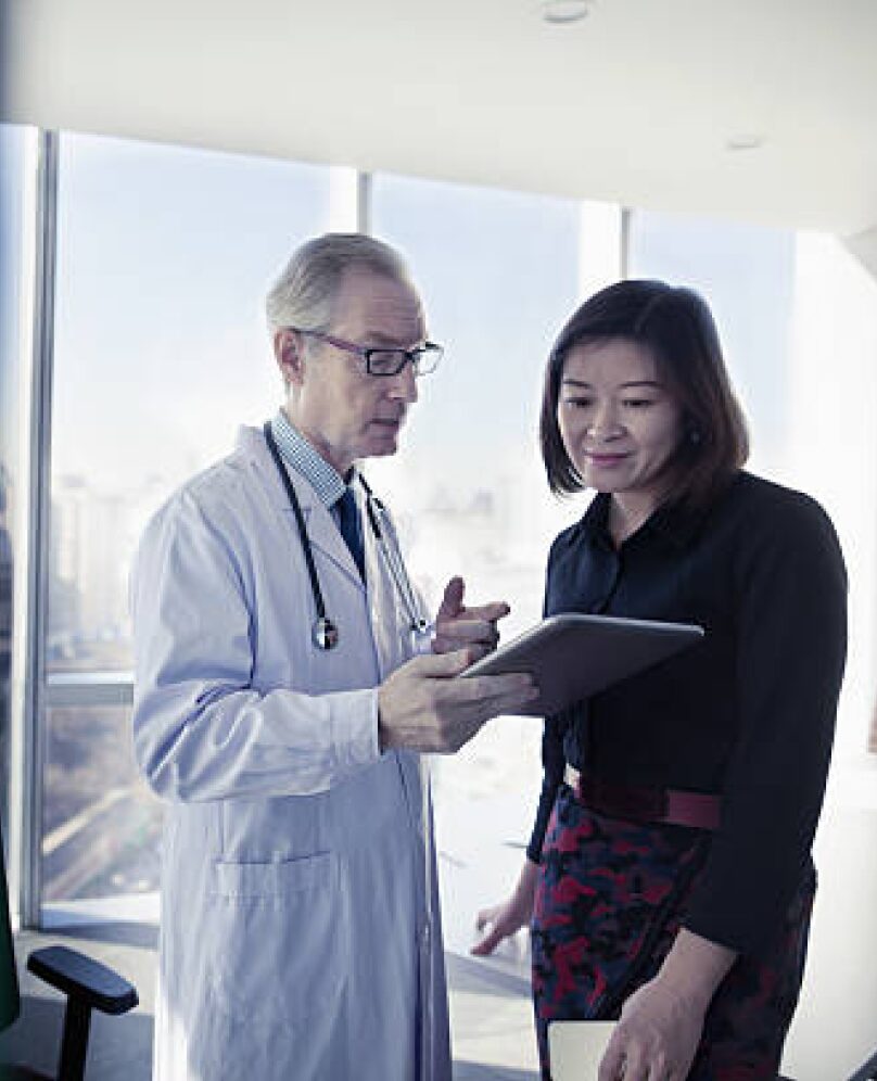 old woman checking with the doctor